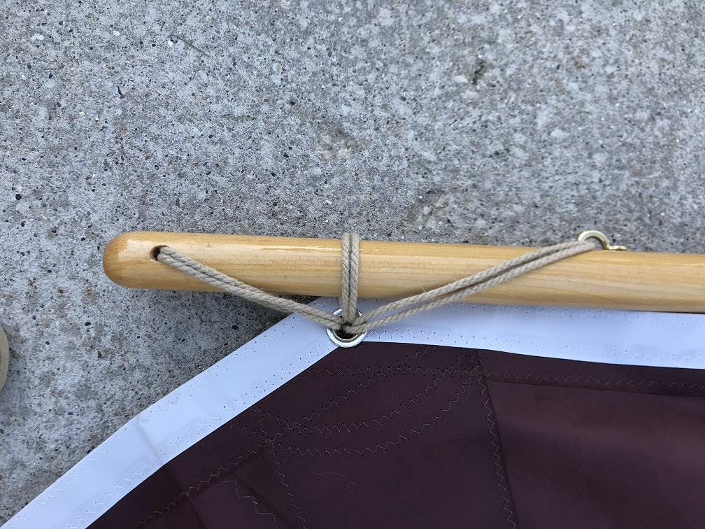 SCAMP throat cringle, lashing SCAMP yard, bending sail to SCAMP yard
